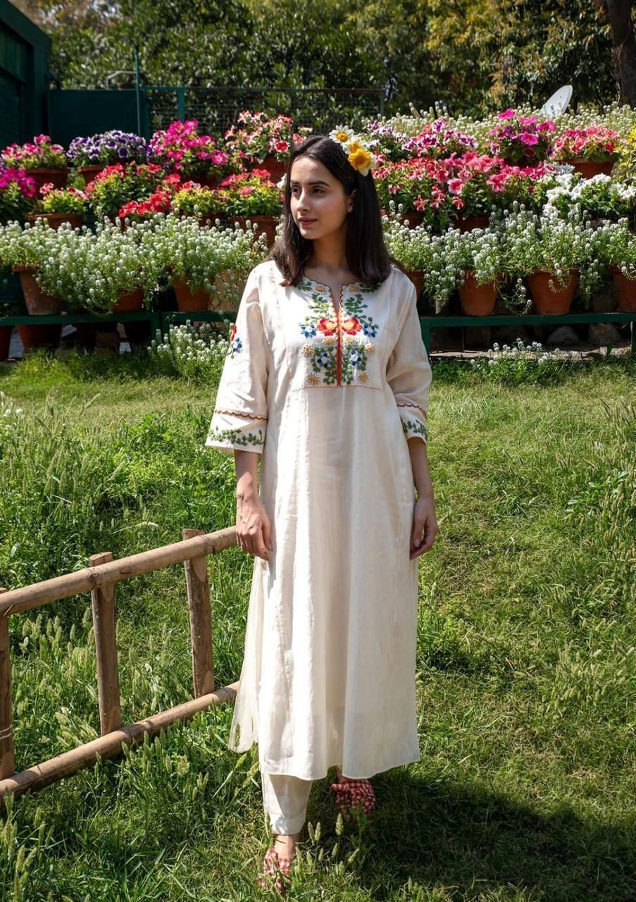 A traditional Kalidar style kurta with colourful threadwork hand embroidery