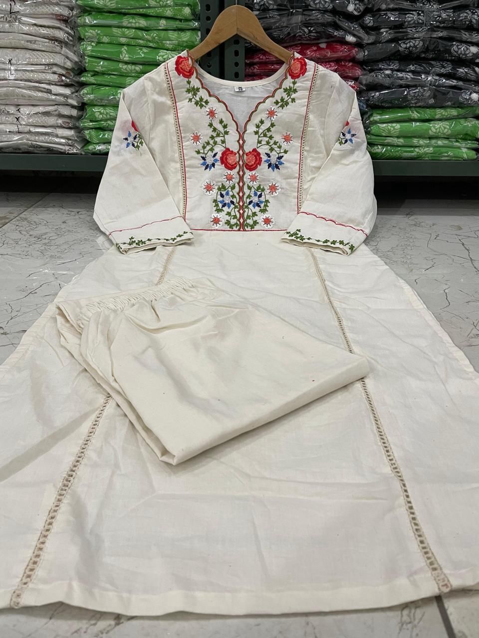 A traditional Kalidar style kurta with colourful threadwork hand embroidery